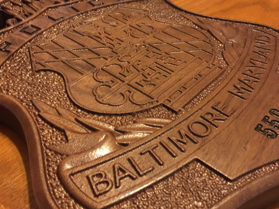 550 wooden badge